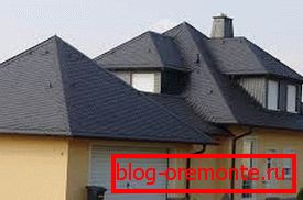 Un exemple de toit magnifique mais complexe et à pentes multiples Un exemple de toit magnifique mais complexe et à pentes multiples