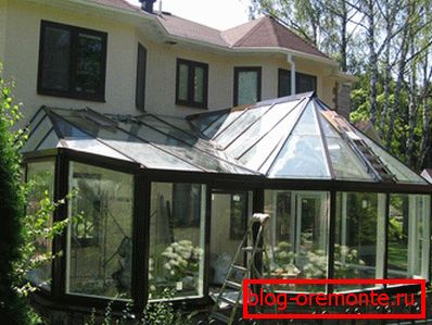 Véranda avec toit transparent